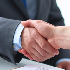 two businessmen shaking hands