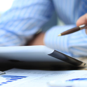 man looking at tablet device with advisor
